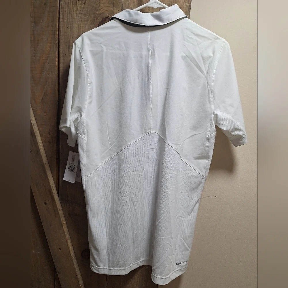 A Nike official Florida Gators short sleeve polo shirt in a men's small. NWT